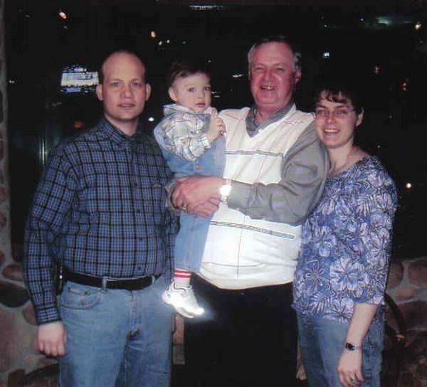 Gene Behler celebrates his 69th birthday at Loon Lake Lodge, Indianapolis, with his son-in-law, J.D. Cash; his grandson, Raymond Cash; and his daughter Rebecca Cash.