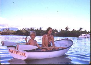 Joe&#039;s son Ross and the late Jody Peplow in the boat Menehune which Joe built. Menehune is Hawaiian for &quot;the little people.&quot;